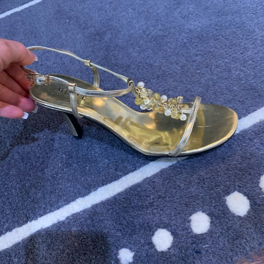 Gold Sandals with pearls and beads.